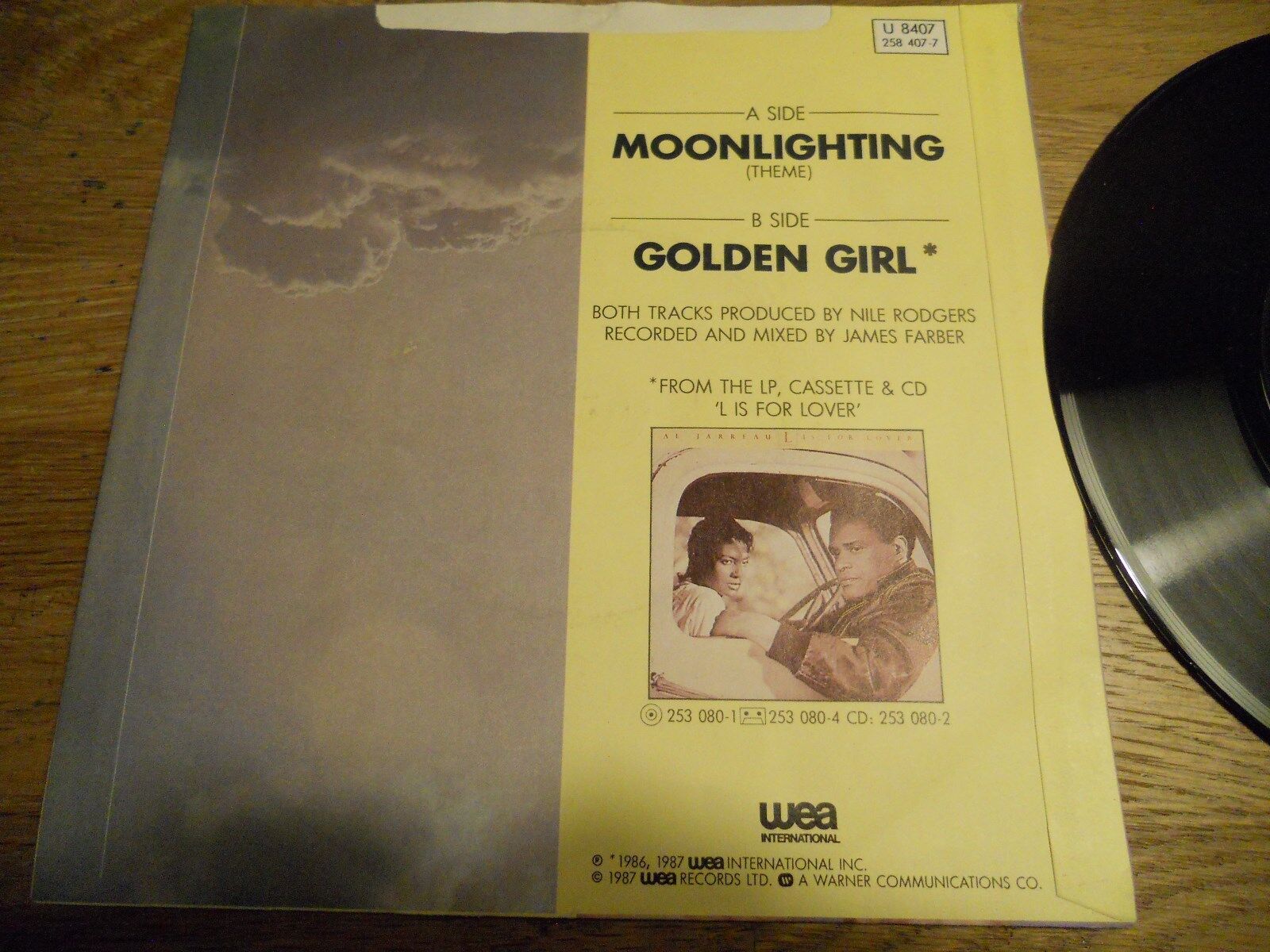 AL JARREAU "MOONLIGHTING (THEME) / GOLDEN GIRL" 1987 UK VINYL SINGLE WEA RECORDS