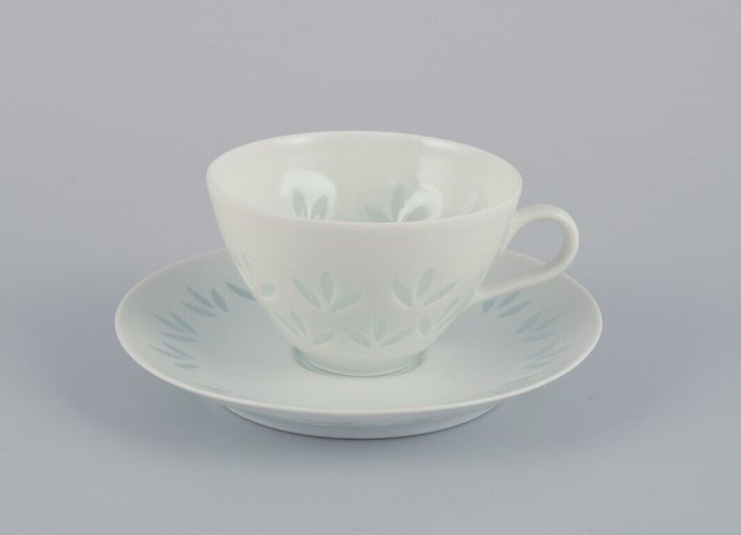 Friedl Kjellberg for Arabia Four coffee cups with saucers in rice porcelain