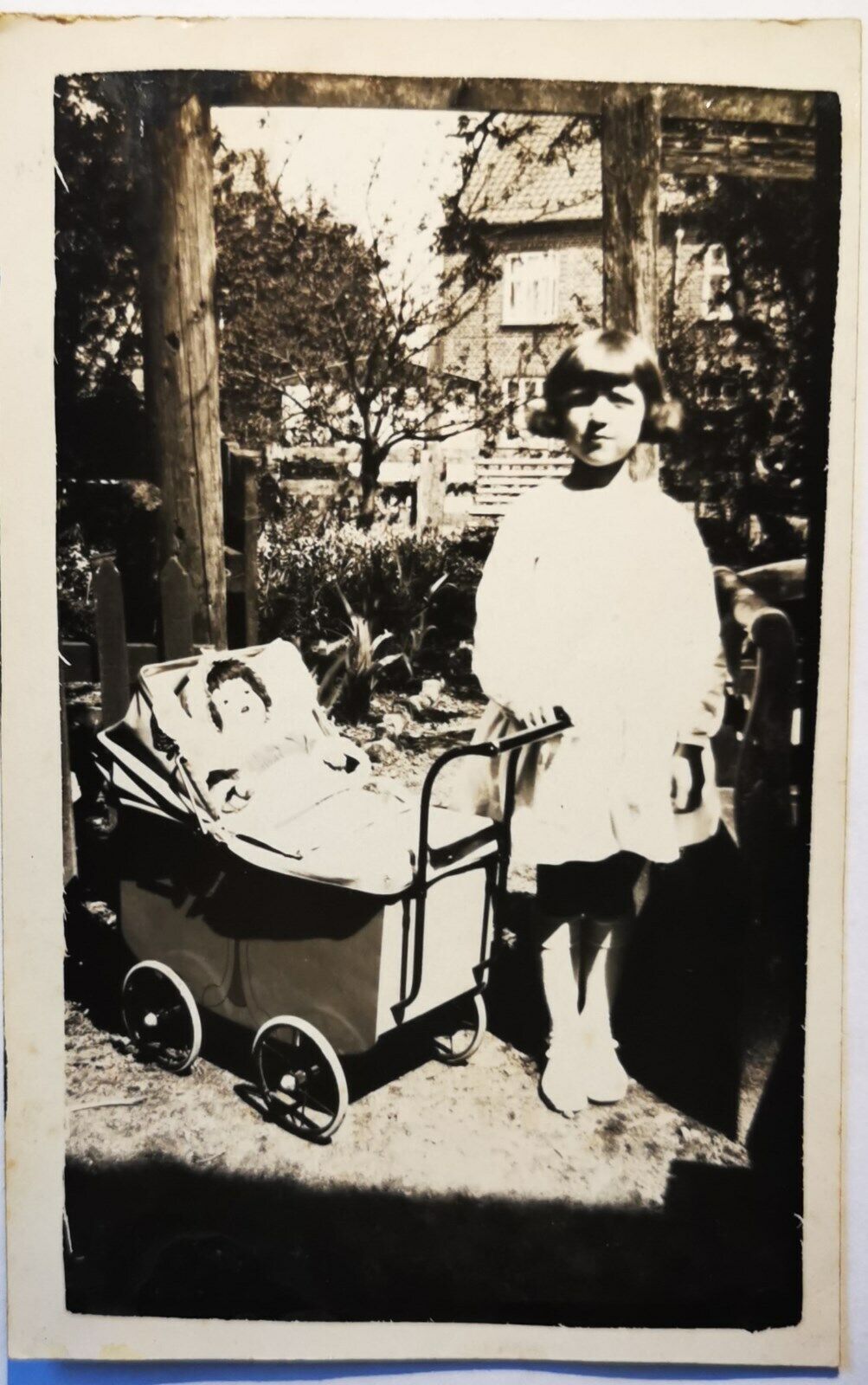 Vtg photo postcard: Pretty little girl with her doll in little pram  Pok1208