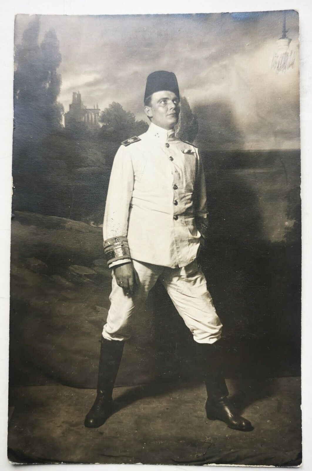 Photo postcard: Male actor ready for a scene in white uniform and fez pok1442