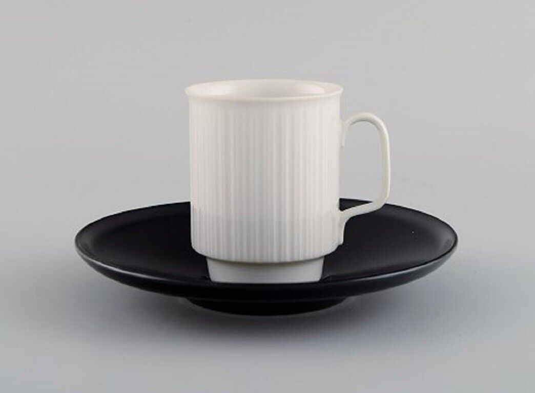 Tapio Wirkkala for Rosenthal Three porcelain noire mocha cups with saucers