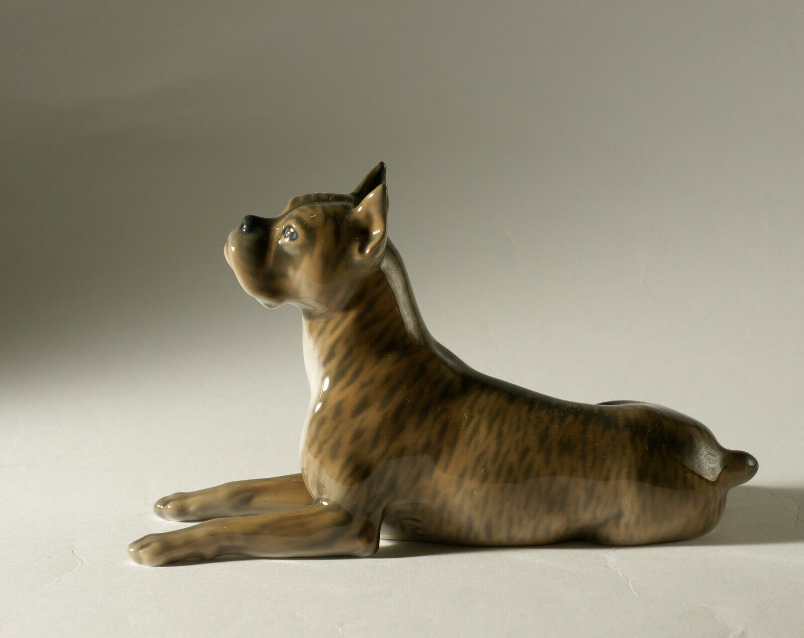 Lying boxer dog figurine of Royal Copenhagen