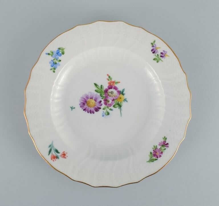 Royal Copenhagen Saxon Flower Four dinner plates in hand-painted porcelain