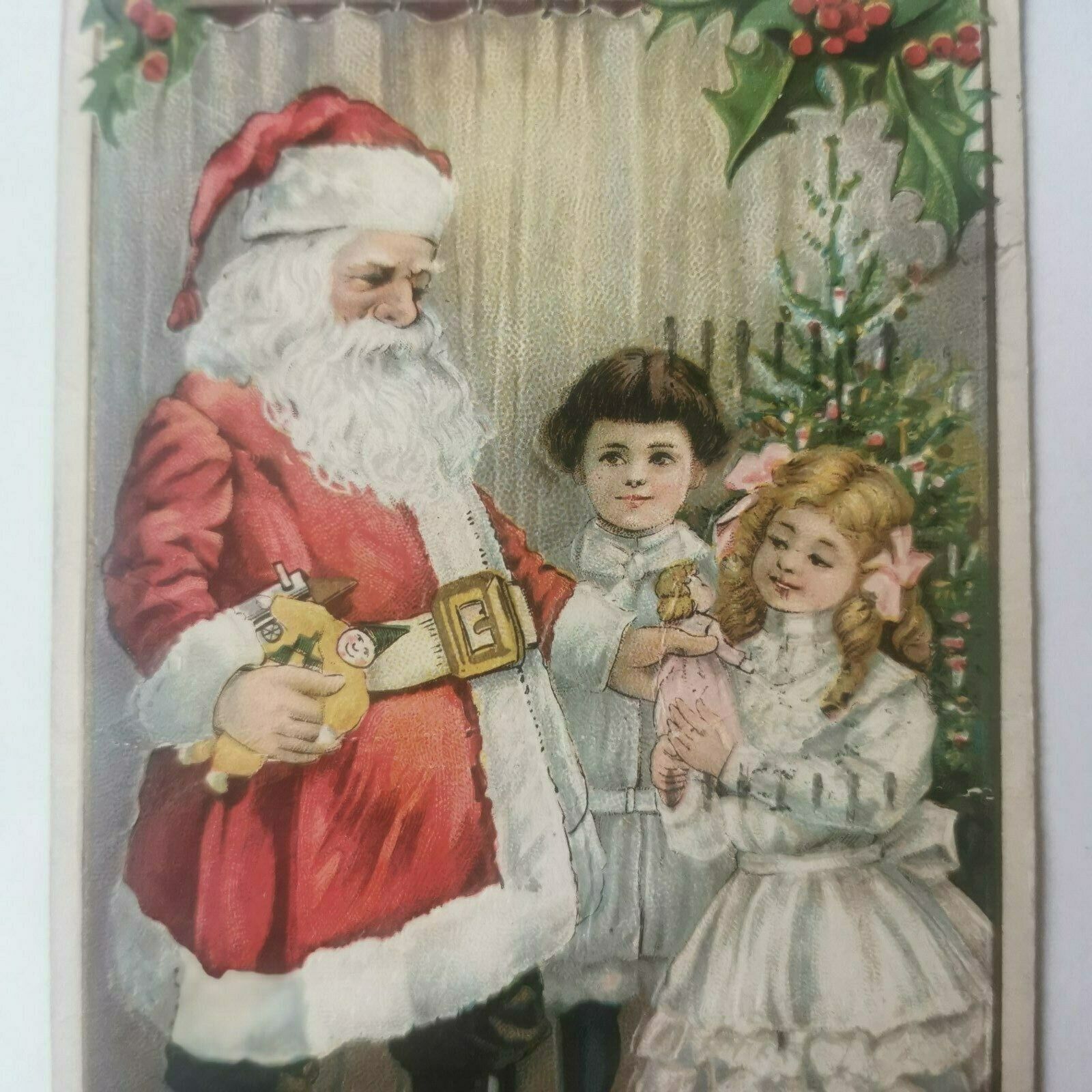 Merry Christmas postcard: Santa Claus gives presents to the girls pok1126