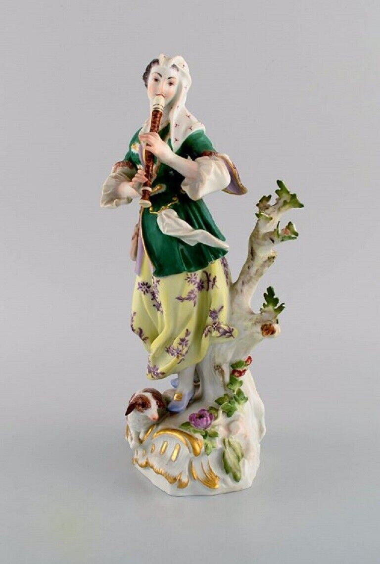 Antique Meissen porcelain figurine Woman playing flute Late 19th century