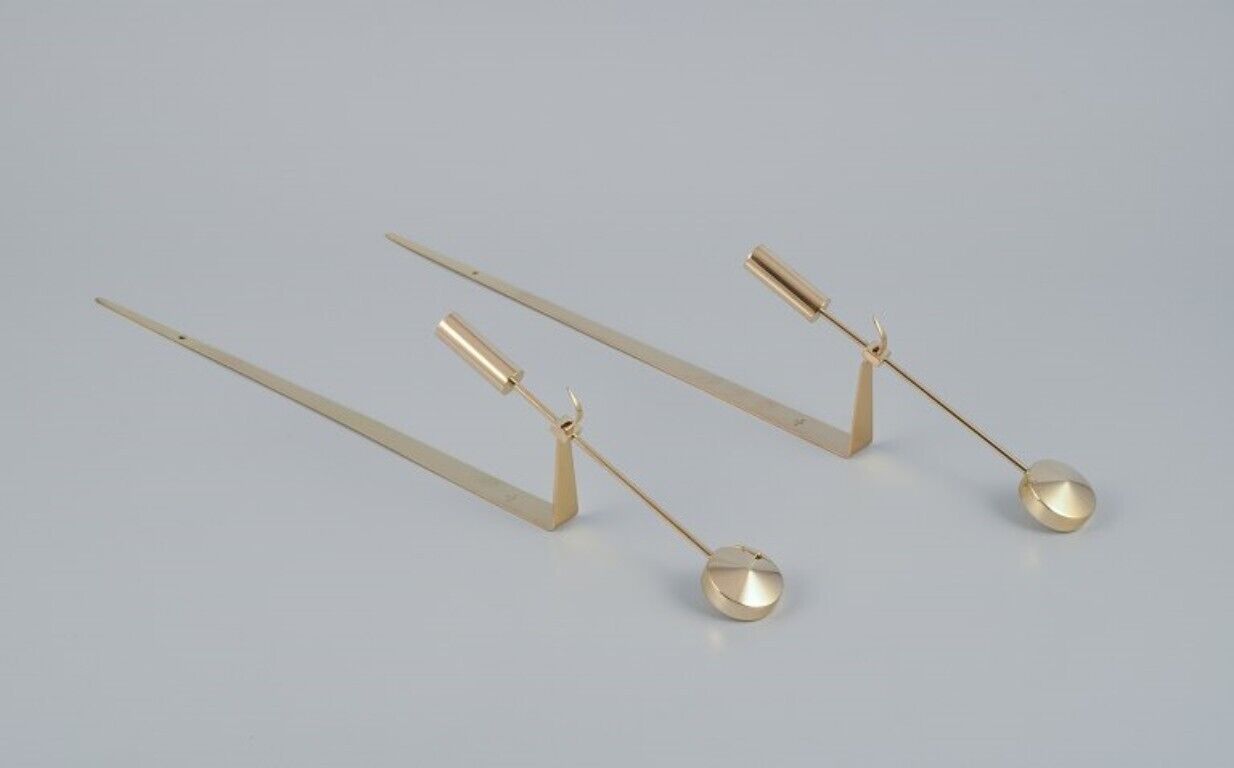 Skultuna Sweden A pair of wall-mounted candle holders in brass