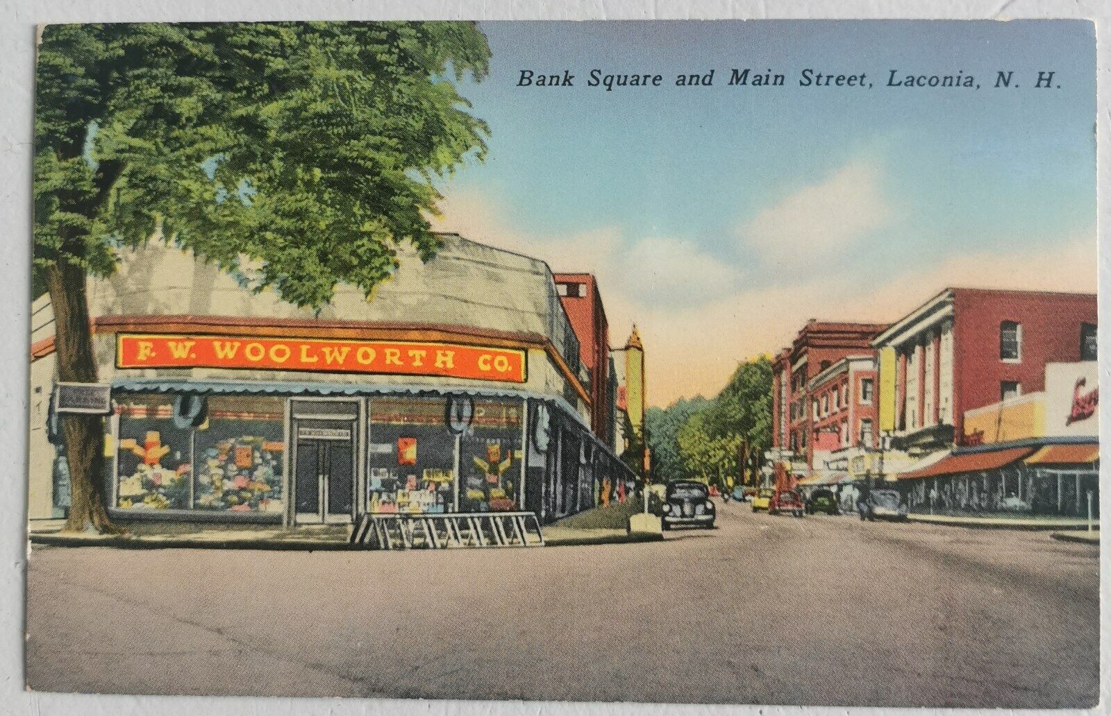 Vintage coloured postcard from Bank Square and Main Street Laconia N H