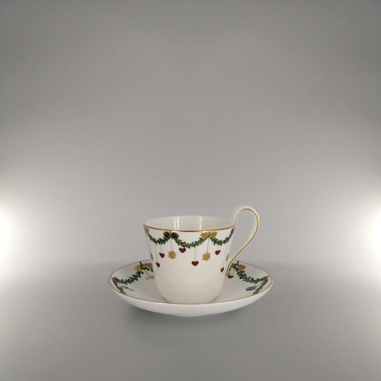 Royal Copenhagen Star Fluted Christmas High Handle Cup with Saucer (24 cl) - #09