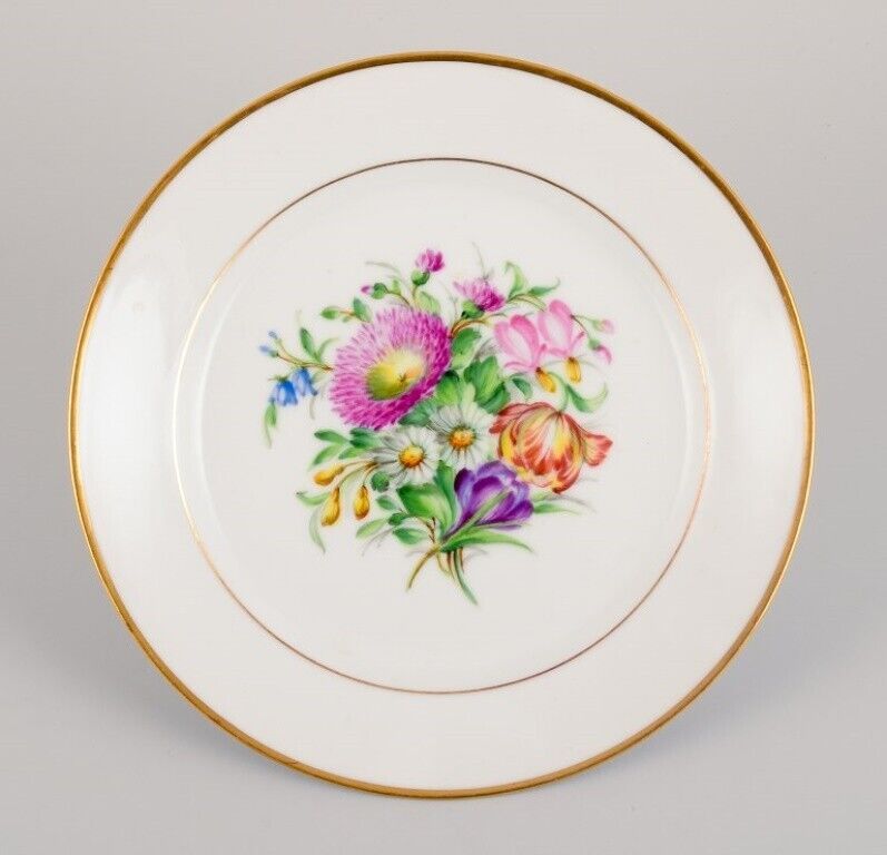 Bing  Grøndahl five porcelain lunch plates with flowers and gold decoration