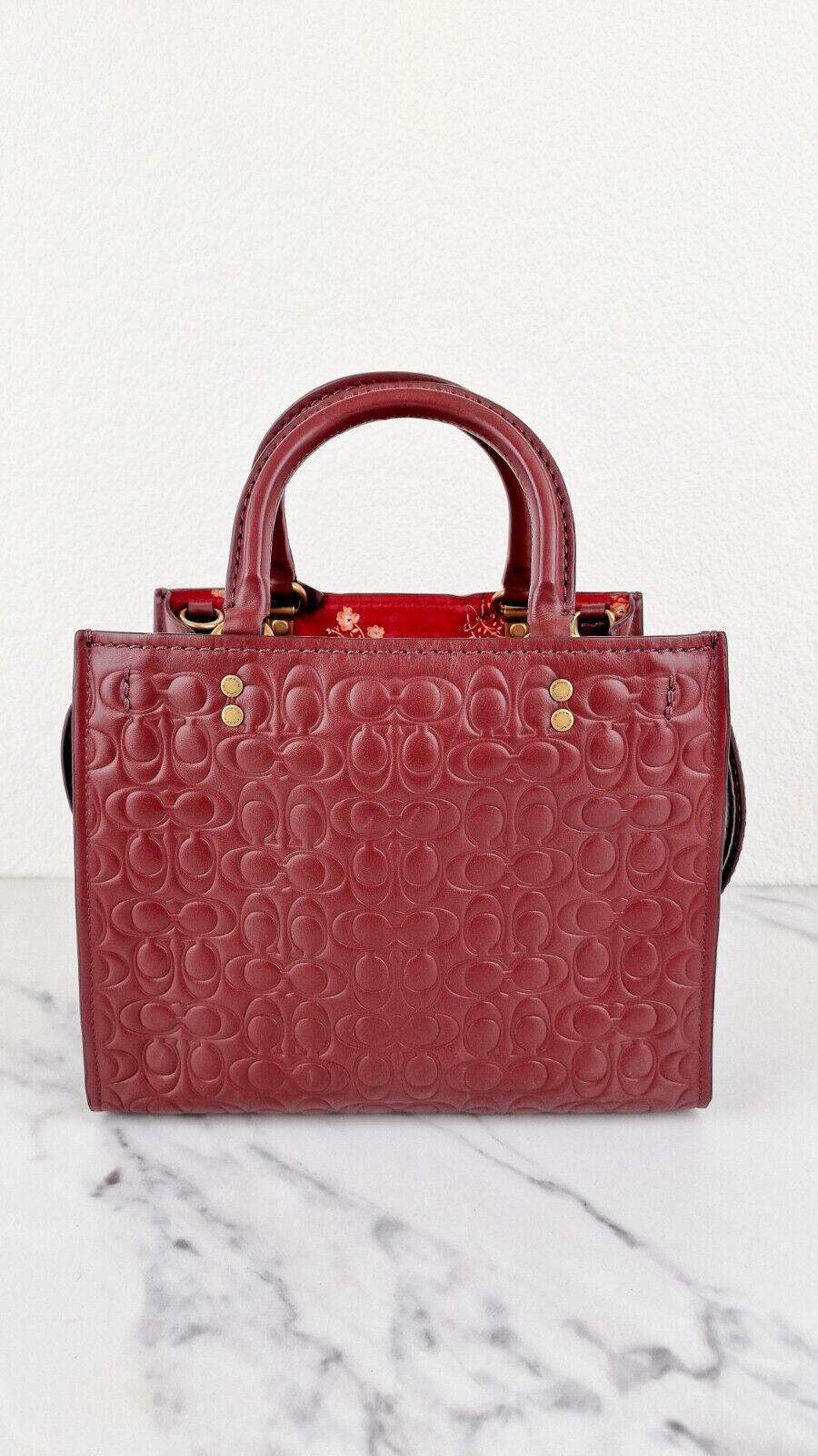 Coach Rogue 25 in Burgundy Signature Embossed Leather Floral Bow Lining 26839