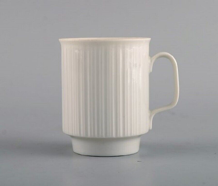 Tapio Wirkkala for Rosenthal Three porcelain noire mocha cups with saucers