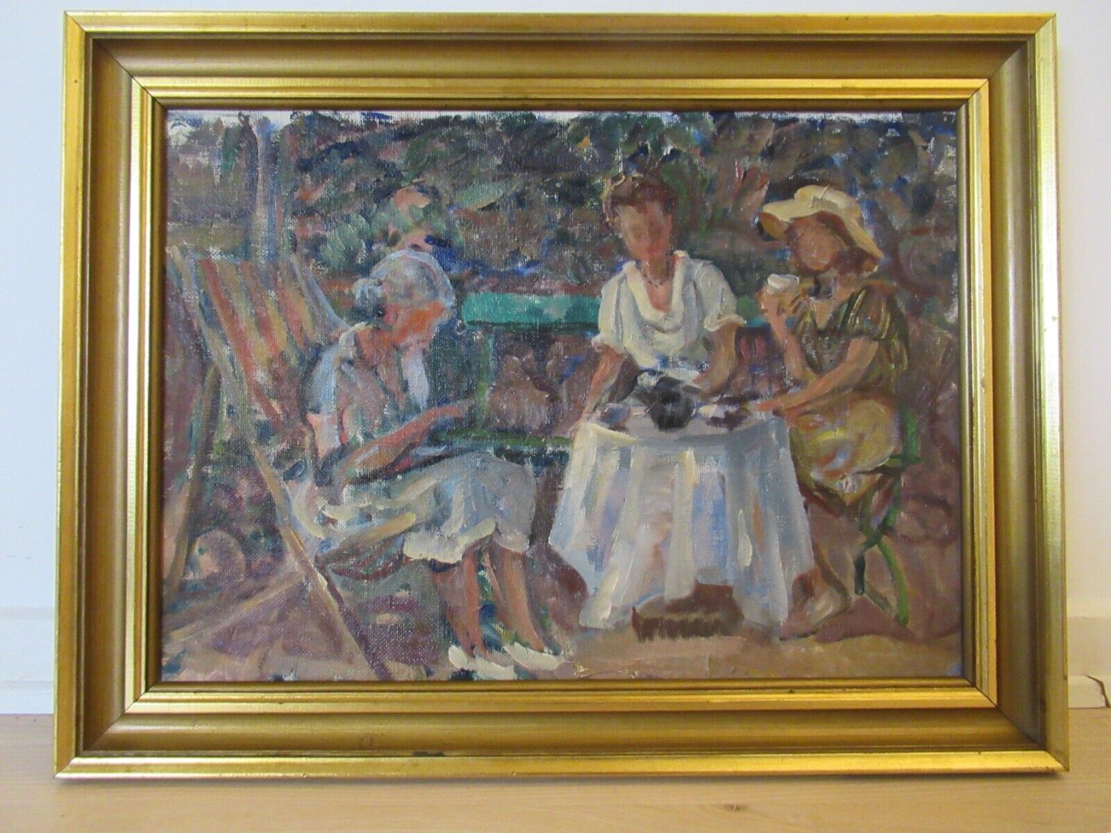 Vintage oil painting "At the gardentable" by acclaimed danish artist Carl Fryden