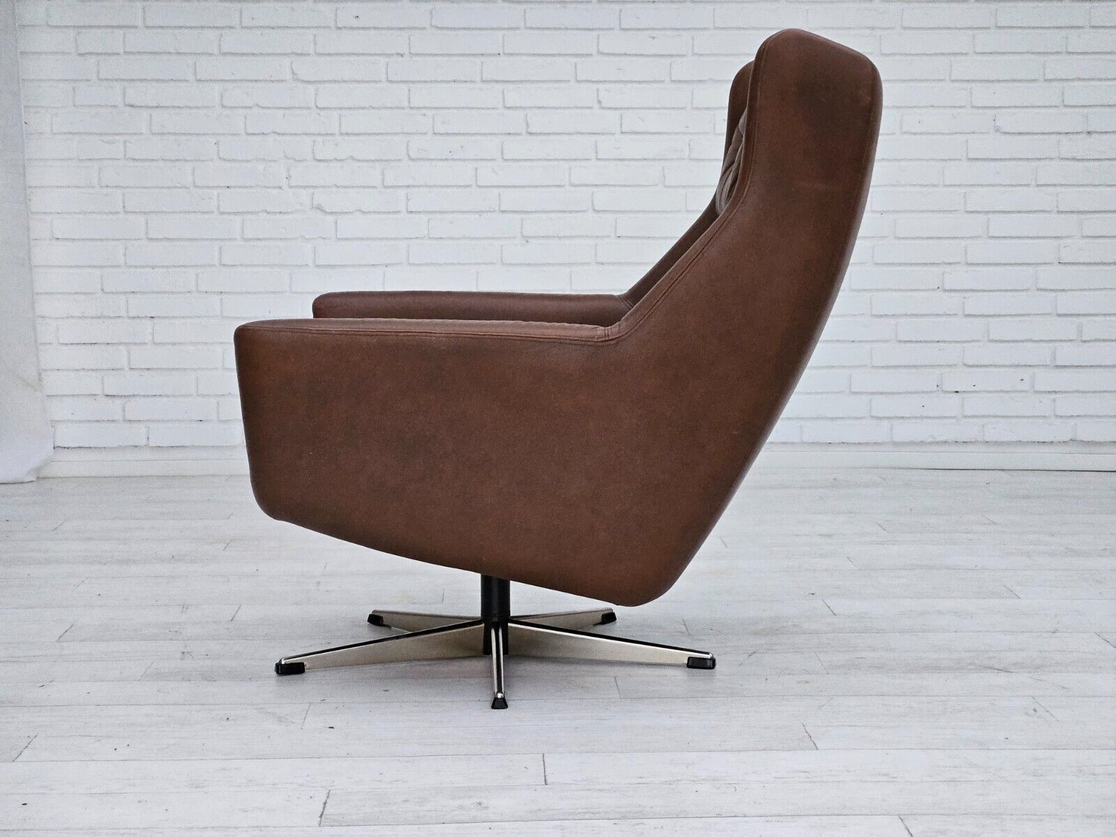 1970s Danish swivel chair with footstool original good condition leather