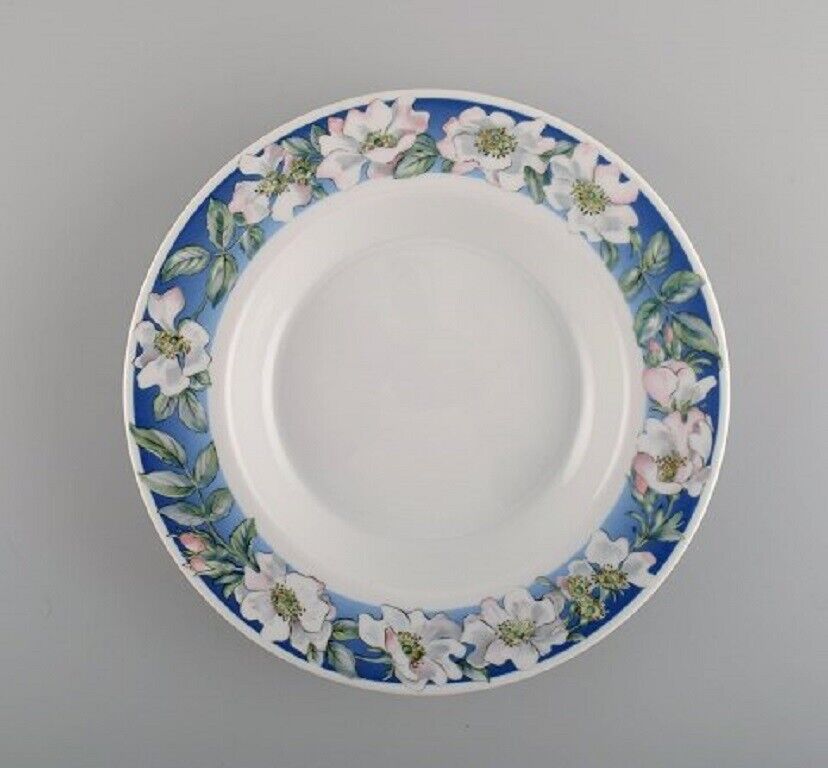 Four Royal Copenhagen White Rose deep plates with blue border white flowers