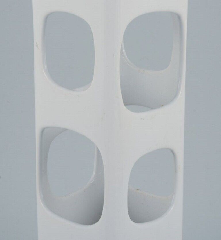 European studio ceramicist Unique vase with holes in white glaze