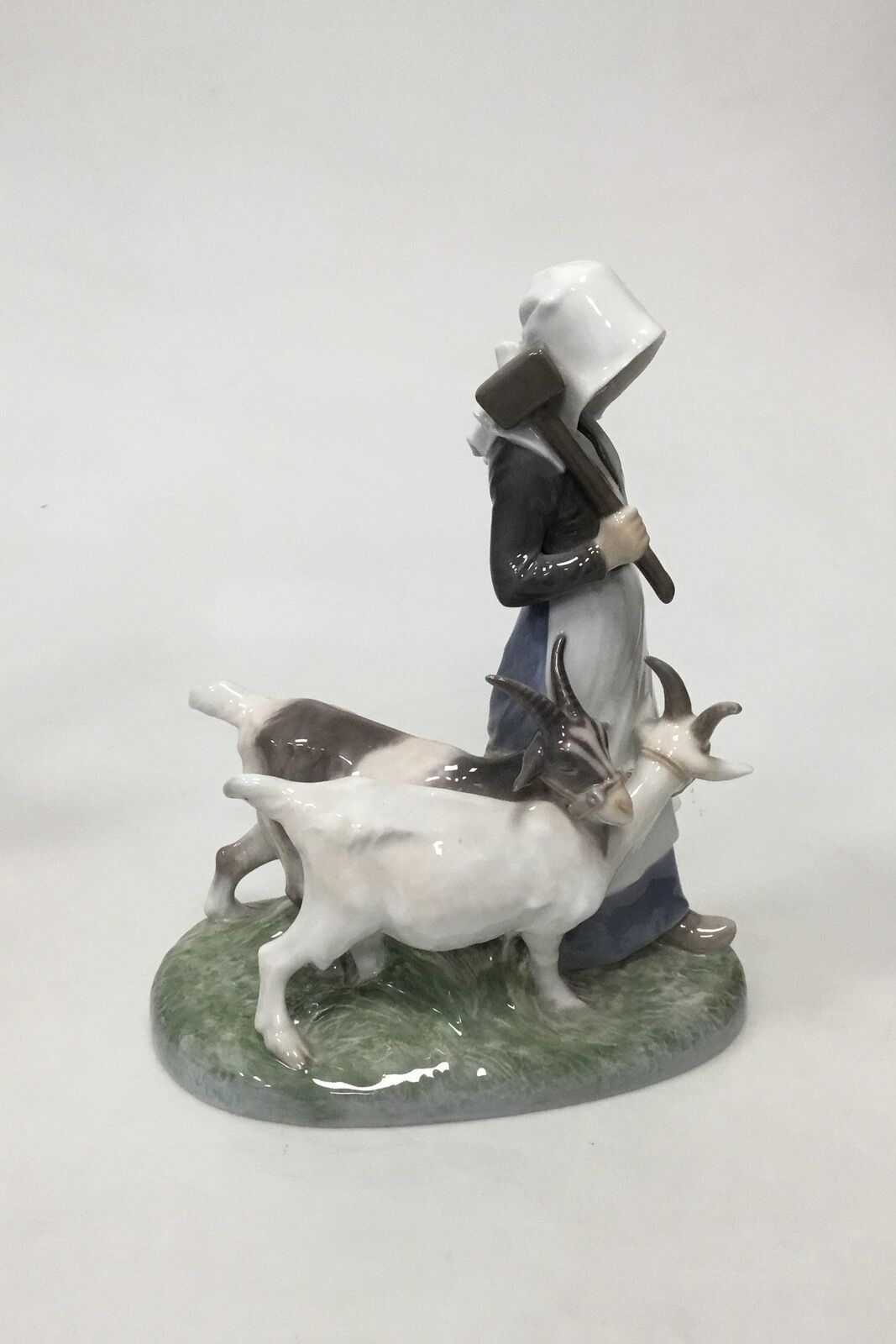 Royal Copenhagen Figurine of Woman with goats No 694