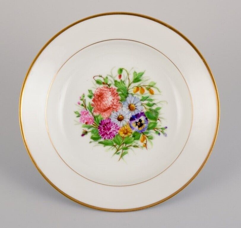 Bing  Grøndahl four deep plates with flowers and gold decoration