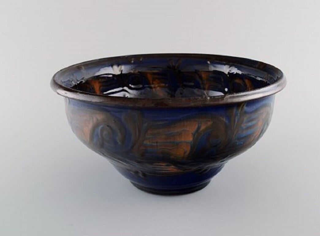 Kähler Denmark Bowl in glazed stoneware Orange foliage on blue background