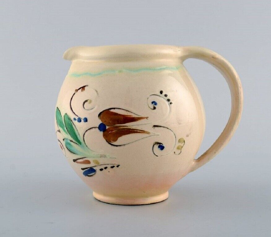 Kähler HAK Jug in glazed stoneware Flowers on a cream colored background