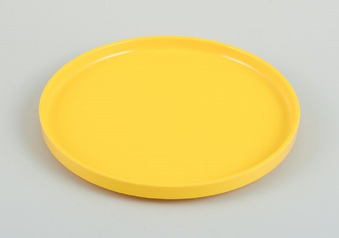 Massimo Vignelli for Heller Italy A set of 8 plates in yellow melamine