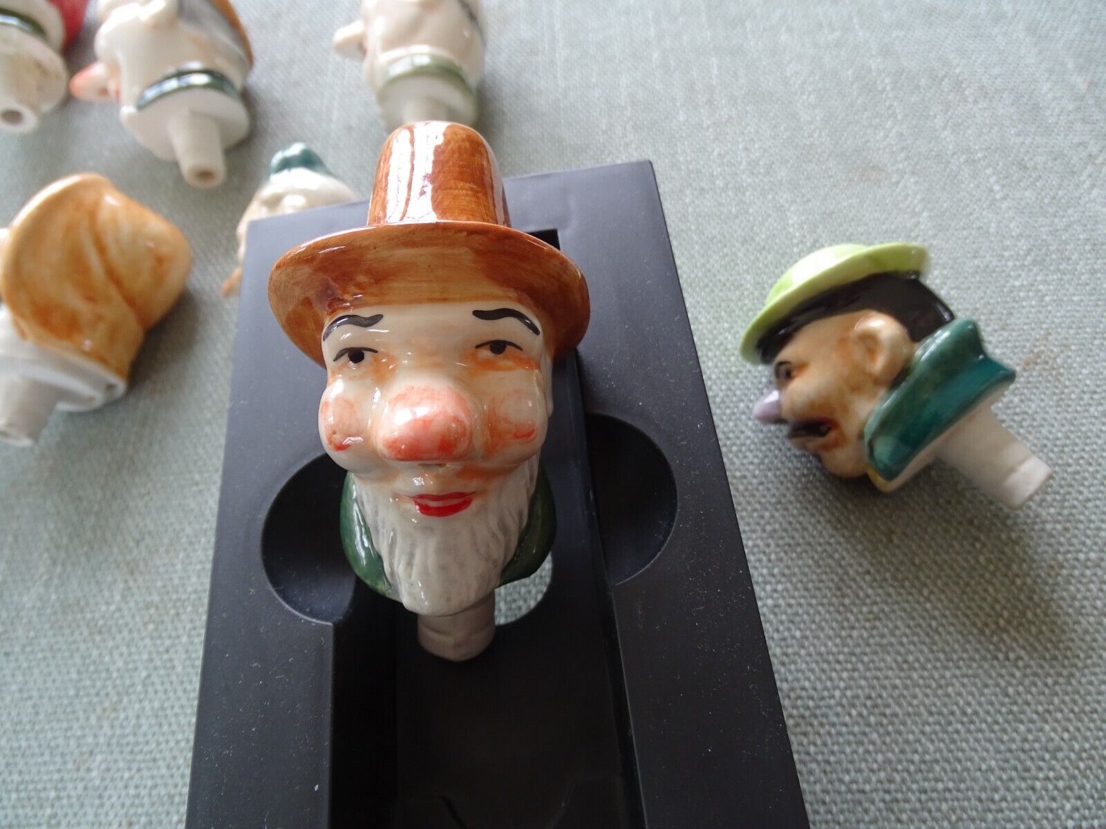 RARE collection of 8 Antique German Porcelain Gnome Pourer Bottle Stoppers