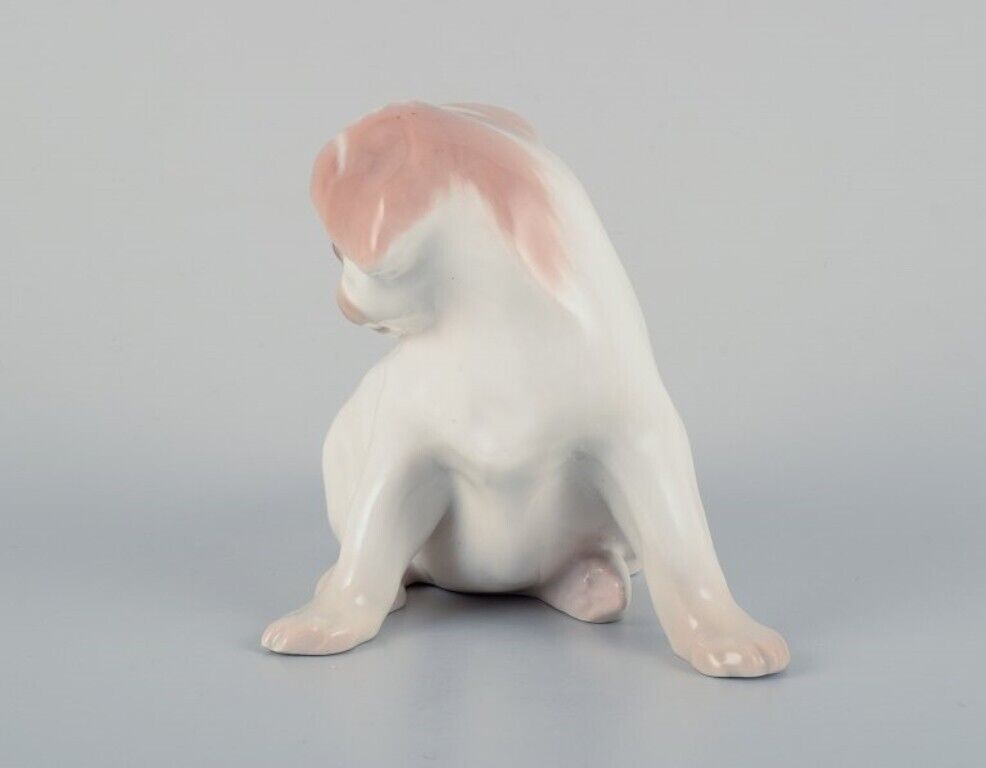 Dahl Jensen for Bing  Grøndahl porcelain figurine of a Pekingese puppy