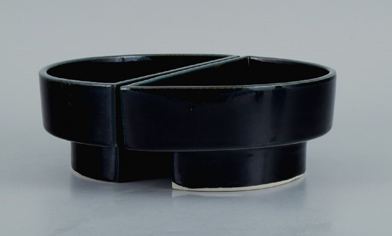 European studio potter Two-piece unique bowl in black glaze Late 1900s