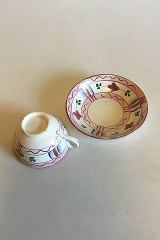 Old Tea Cup with red decoration