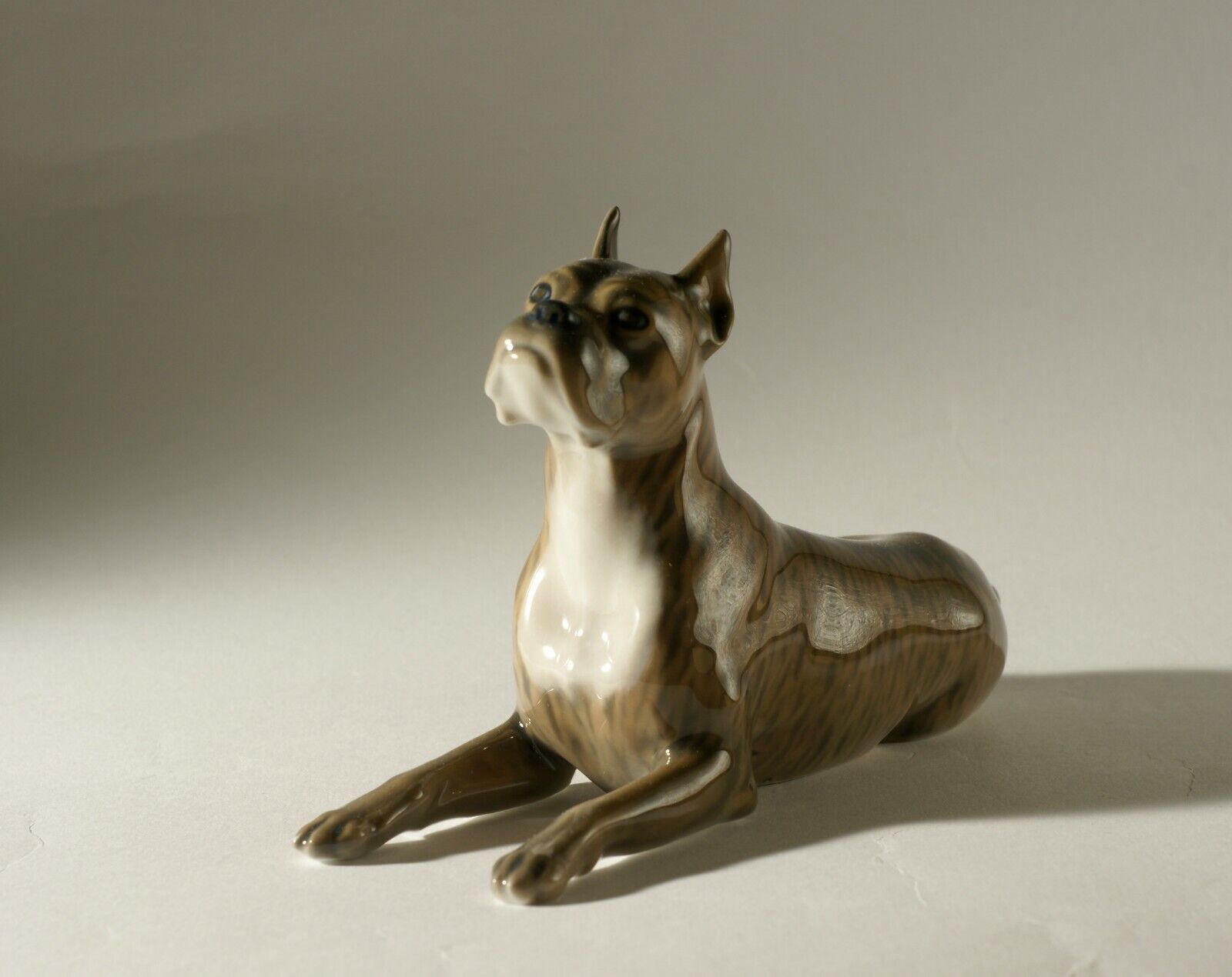 Lying boxer dog figurine of Royal Copenhagen