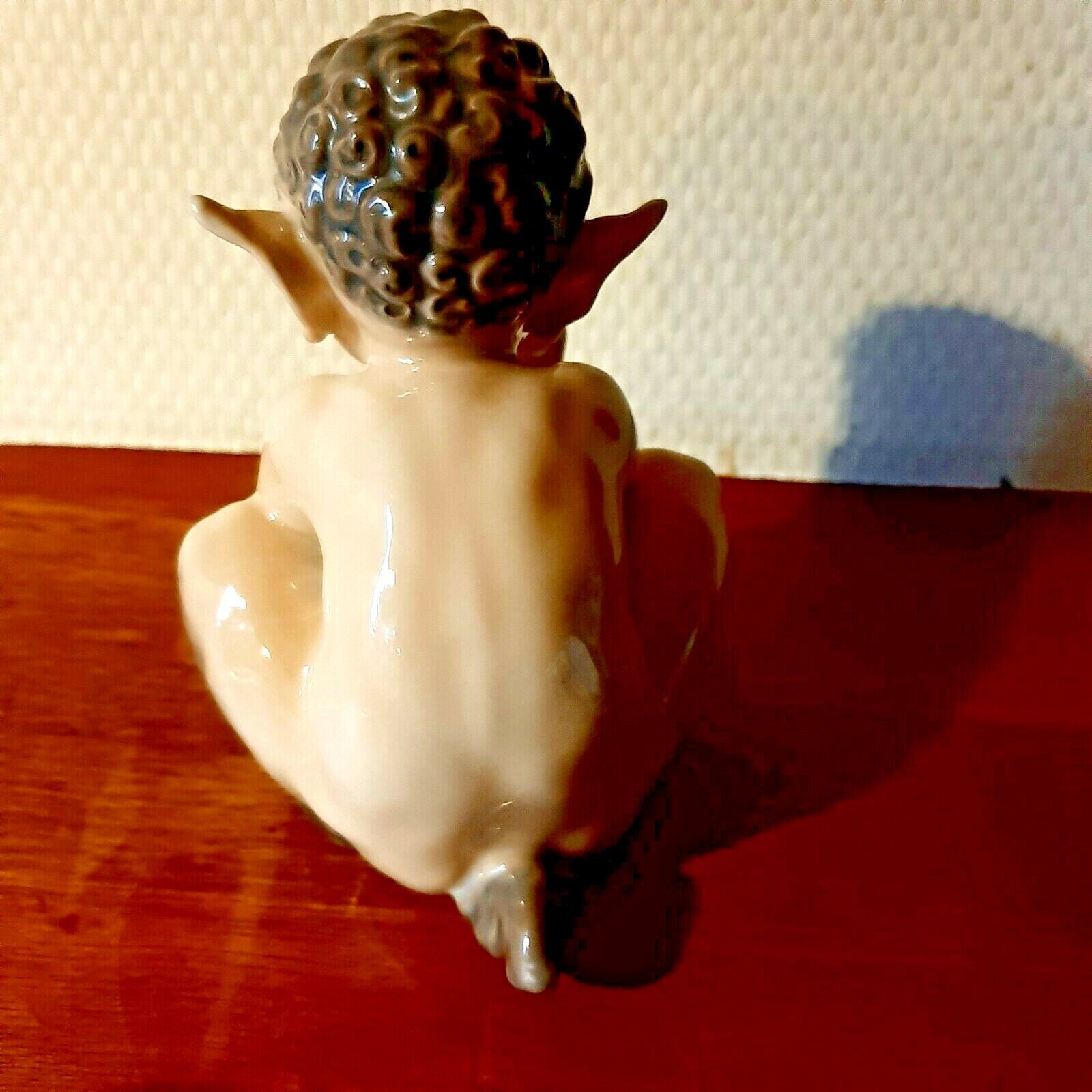 FAUN with SNAKE # 1712 by Chr Thomsen for ROYAL COPENHAGEN 1962