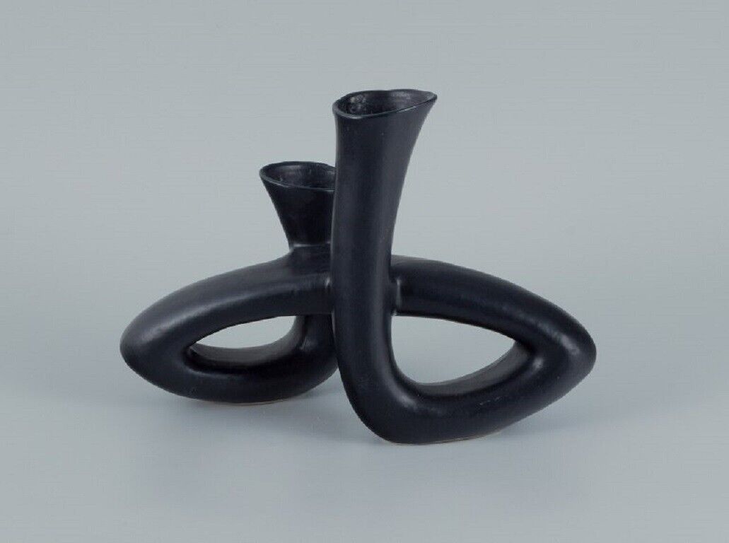 European studio ceramicist Unique twisted vase in black glaze