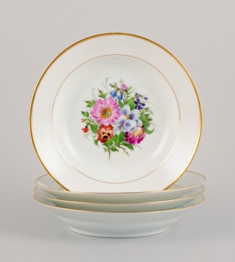 Bing  Grøndahl four deep plates with flowers and gold decoration