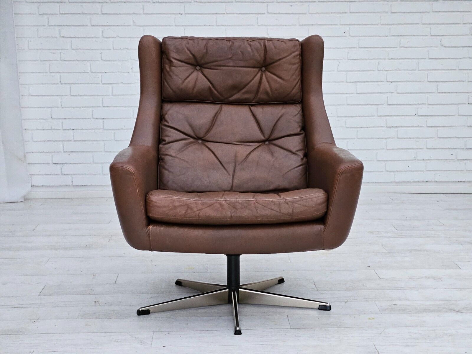 1970s Danish swivel chair with footstool original good condition leather