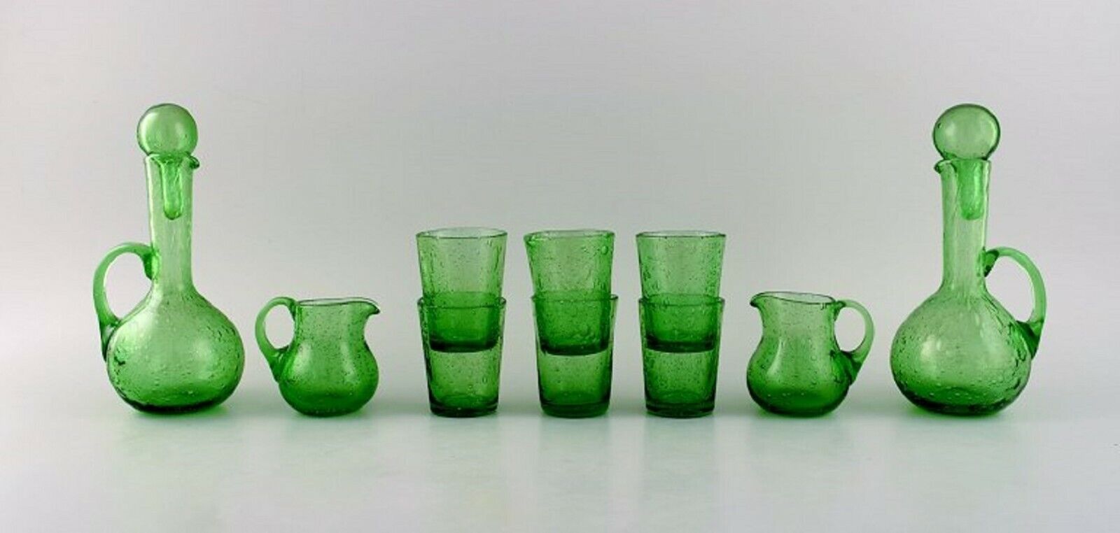 Biot France Two decanters six glasses and two small jugs in green art glass