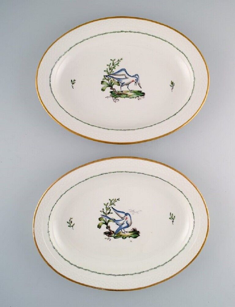 Two large oval Royal Copenhagen serving dishes in hand-painted porcelain