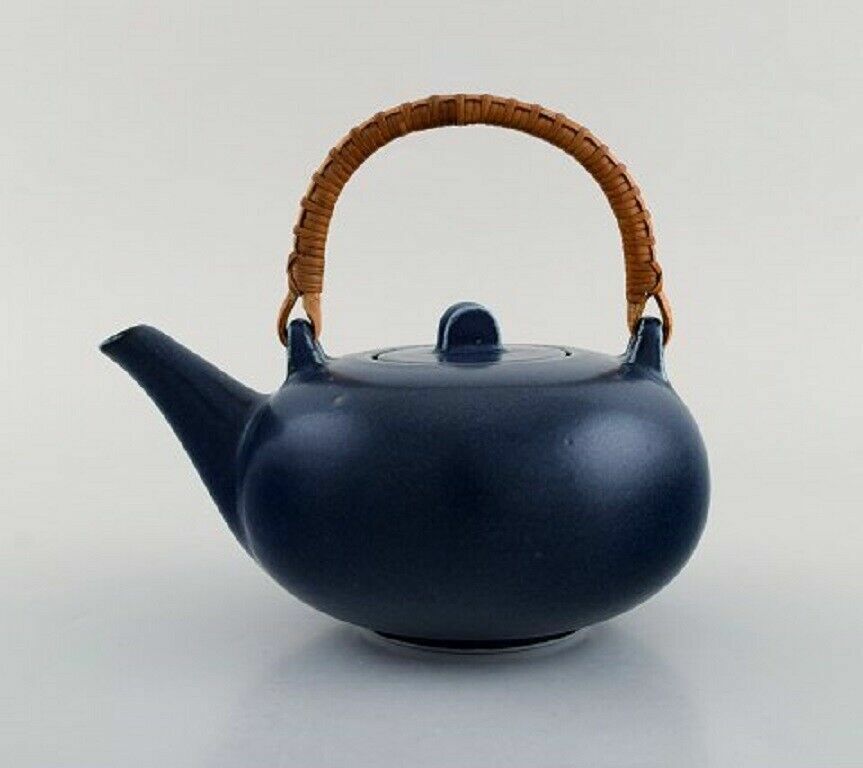 Eva Stæhr-Nielsen for Saxbo Teapot in glazed ceramics with handle in wicker