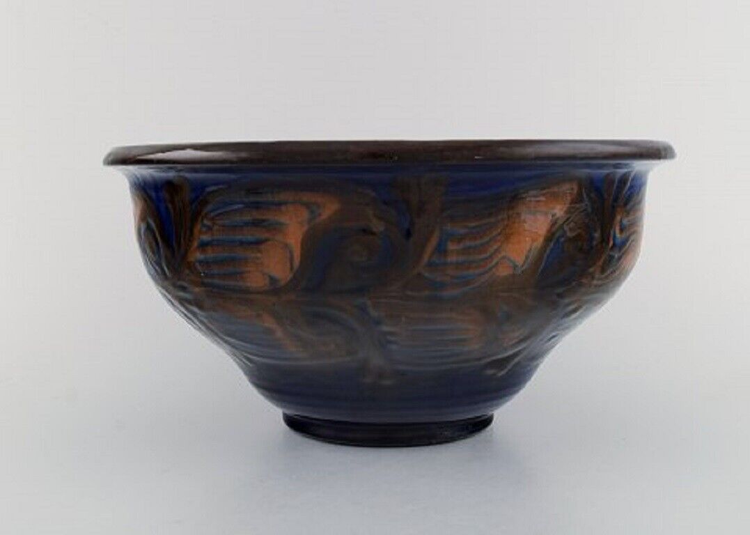 Kähler Denmark Bowl in glazed stoneware Orange foliage on blue background