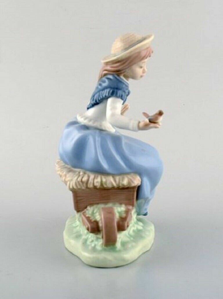 Lladro and Nao Spain Four porcelain figurines of children 1980 / 90's