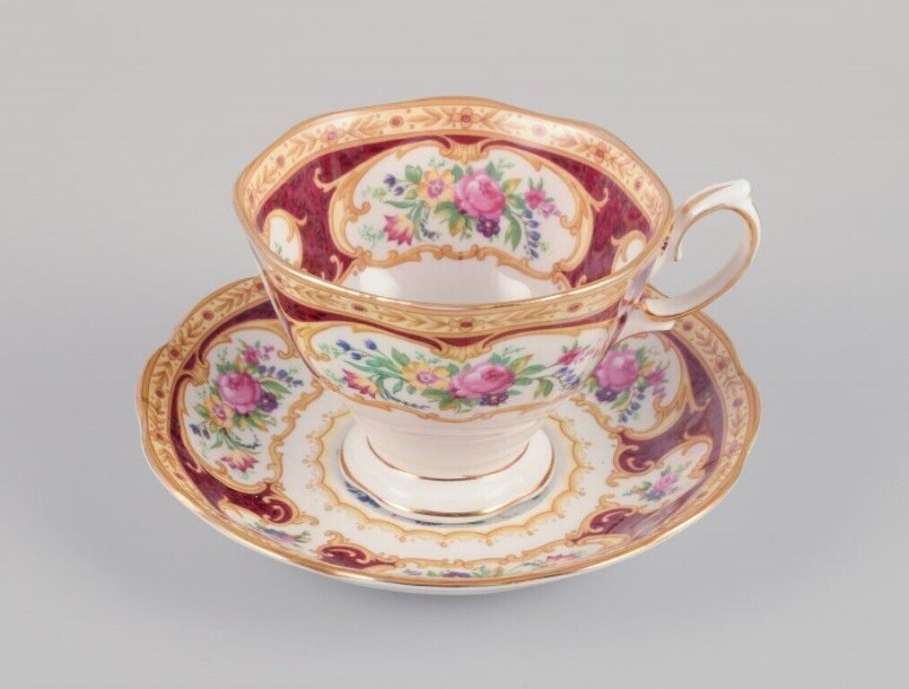 Royal Albert England Set of four "Lady Hamilton" coffee cups with saucers
