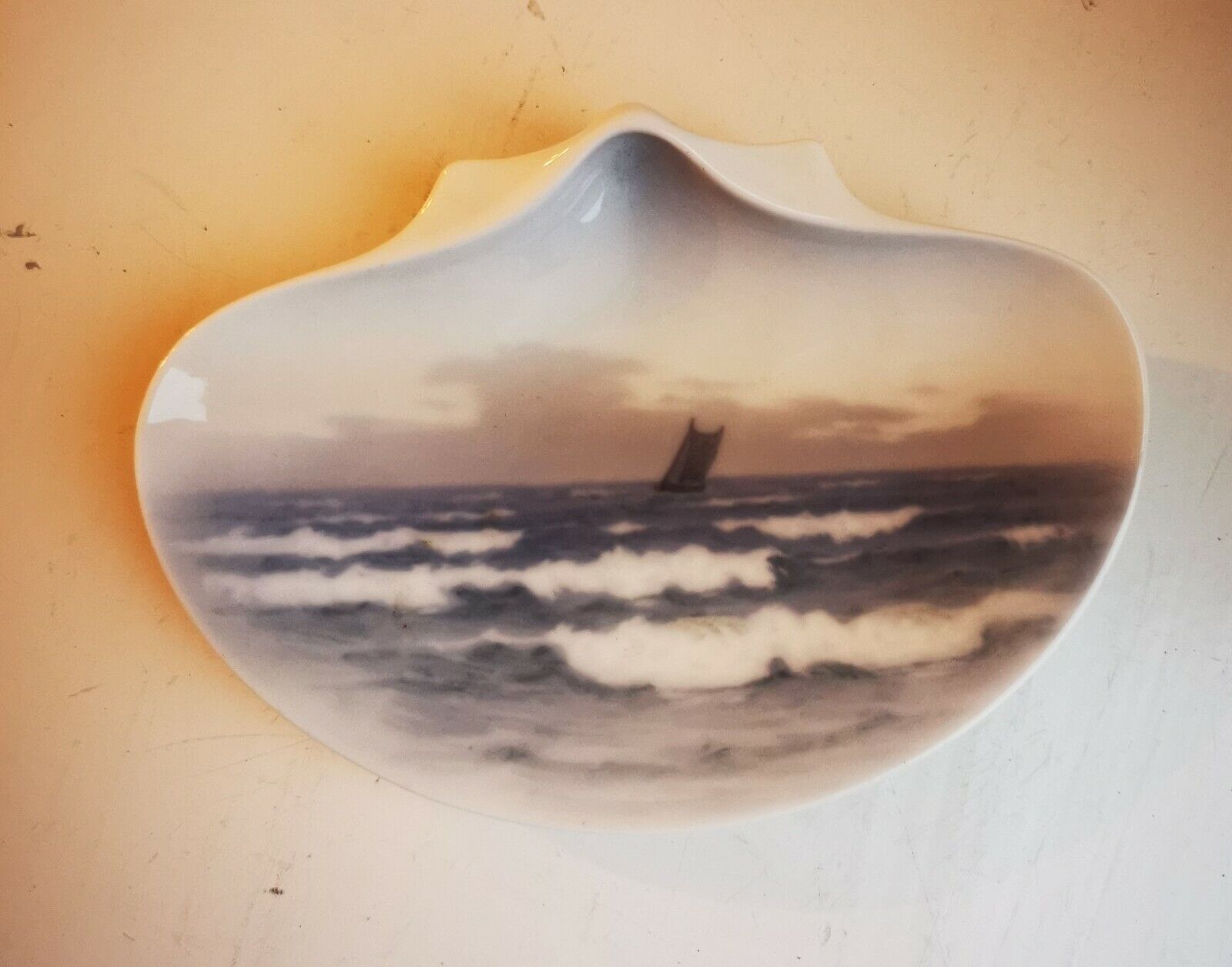 Old Royal Copenhagen porcelain dish in organic shape with boad sea motif 1930s