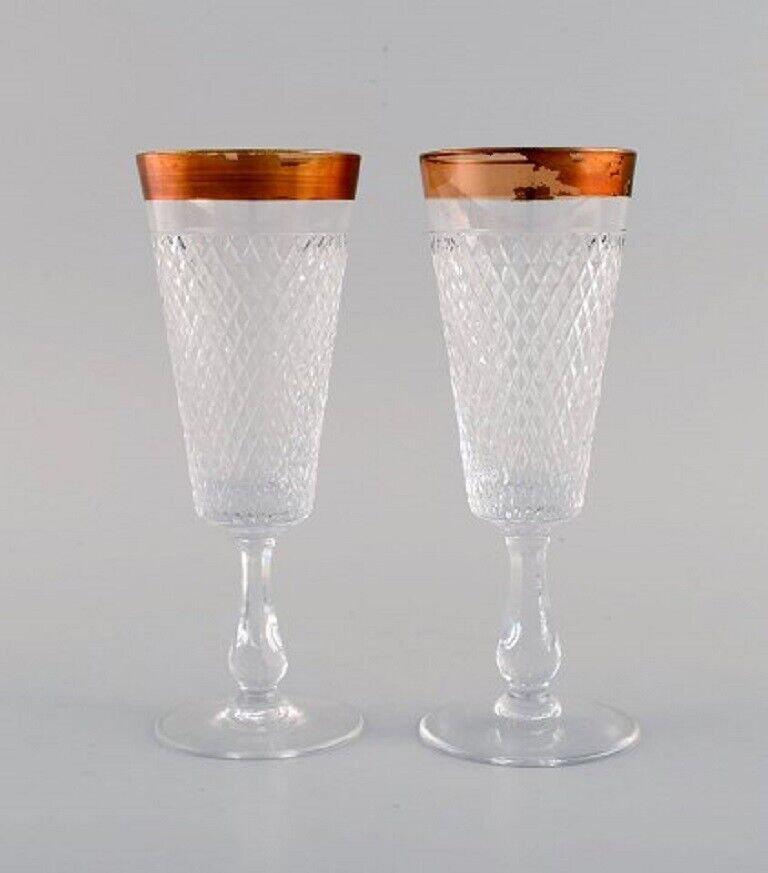 14 glasses in mouth-blown crystal glass with gold edge France 1930s