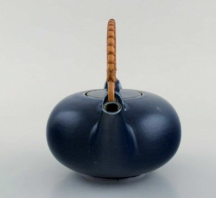 Eva Stæhr-Nielsen for Saxbo Teapot in glazed ceramics with handle in wicker