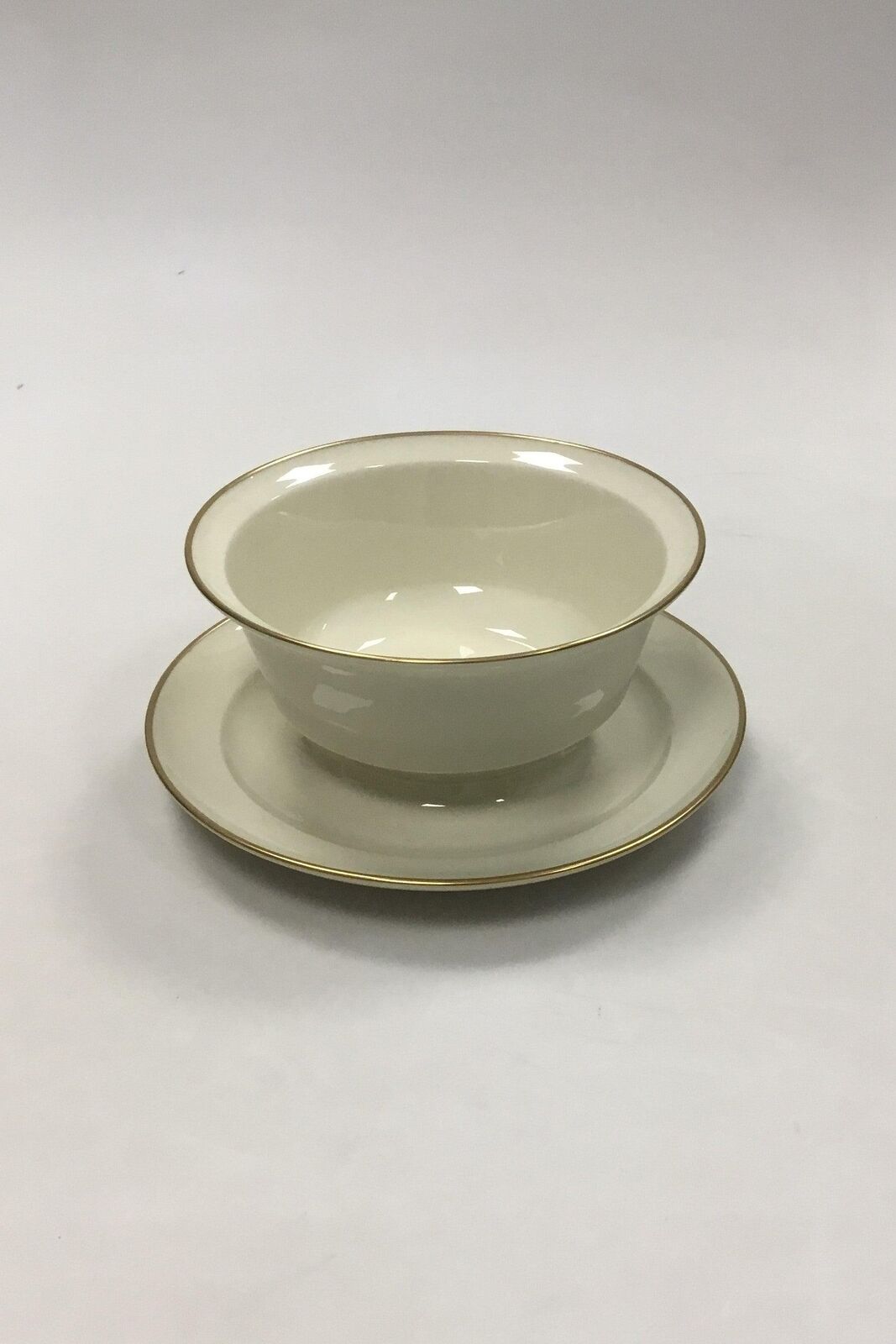 Royal Copenhagen Smooth cream-colored Pattern Sauce bowl with gold edge No 9580