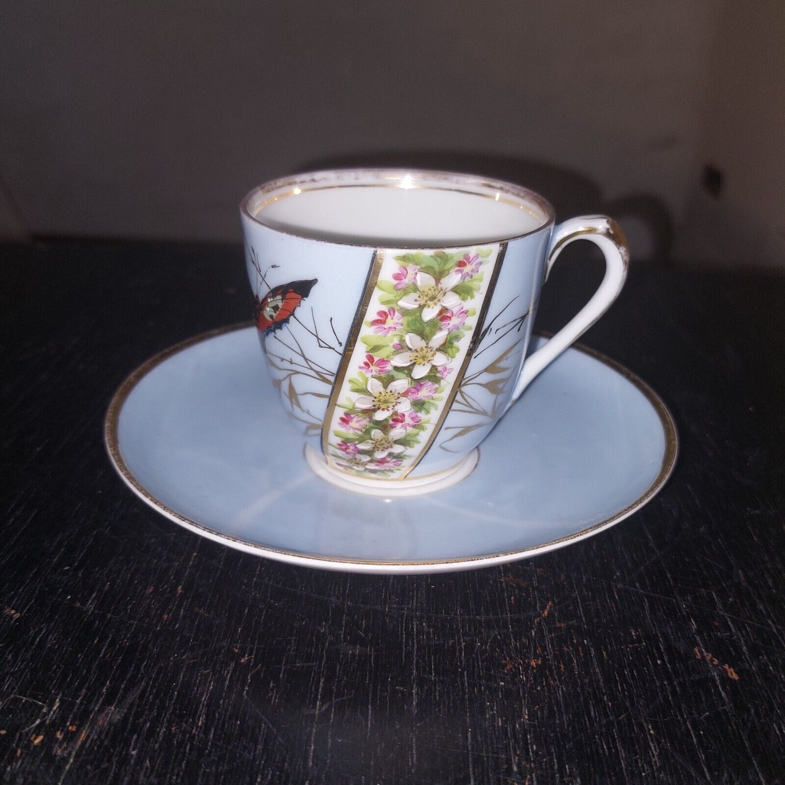 Art Nouveau porcelain cup and saucer from BG with butterfly decoration c 1900