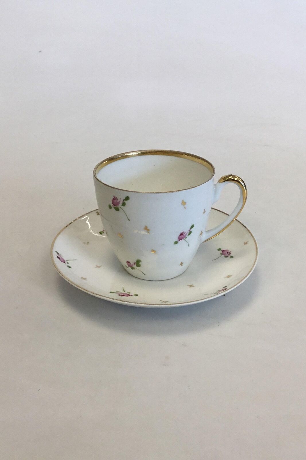 Bing  Grondahl Old Coffee Cup decorated with small flowers and golden clover