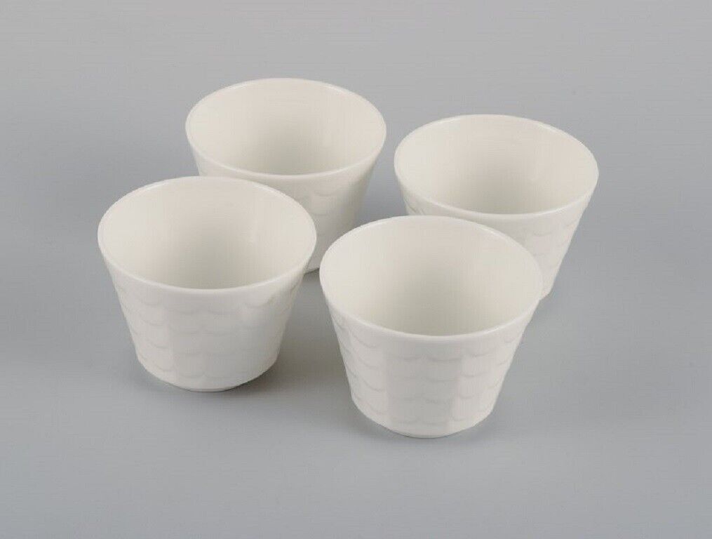 Wilhelm Kåge for Gustavsberg Four flower pot covers in porcelain