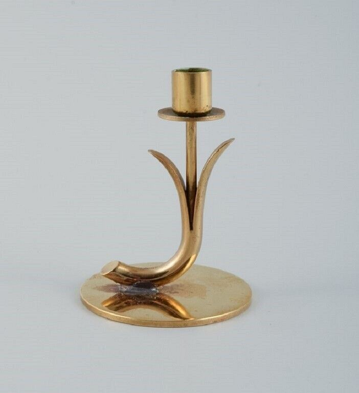 Gunnar Ander for Ystad Metall Three brass candlesticks 1950s