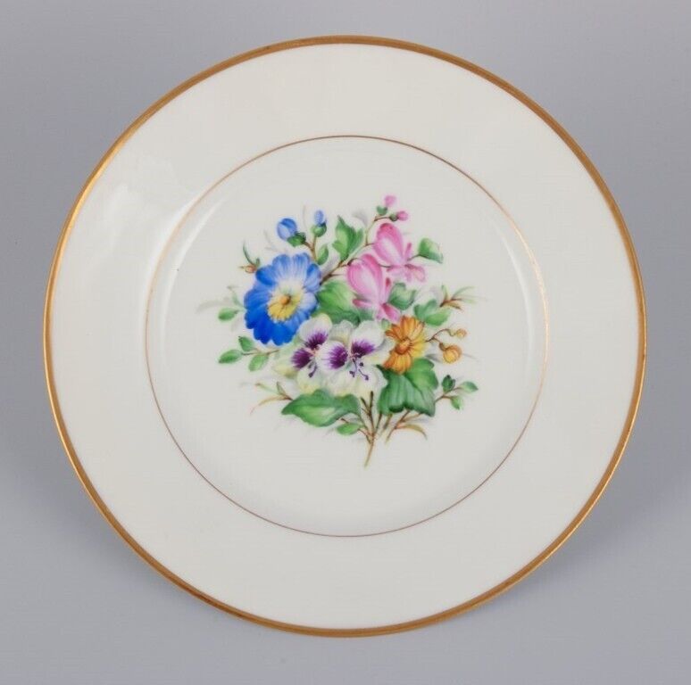 Bing  Grøndahl Denmark Set of five porcelain plates hand-painted with flowers