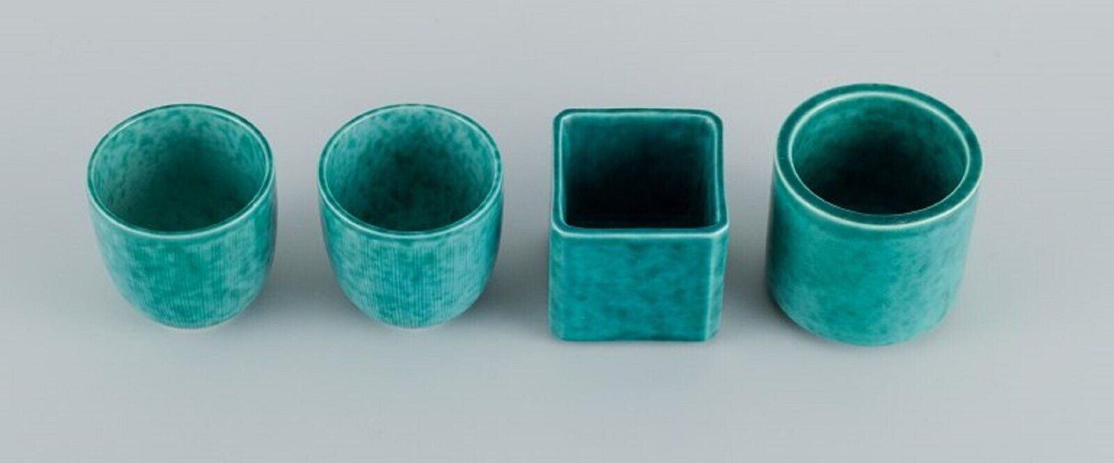 Wilhelm Kåge for Gustavsberg Four Argenta Art Deco vases in glazed ceramics