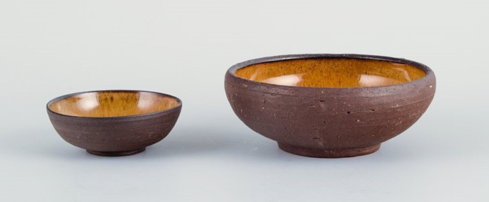 Osa Denmark Two small retro unique ceramic bowls with yellow-brown glaze